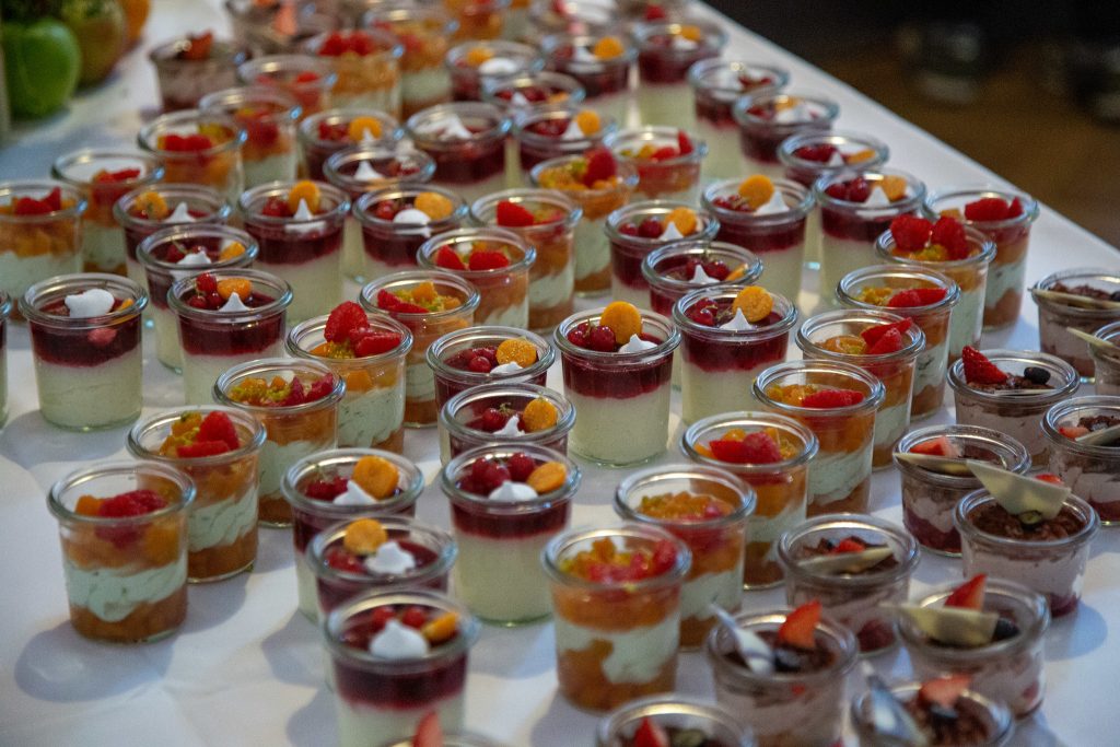 photo of a table with deserts on it