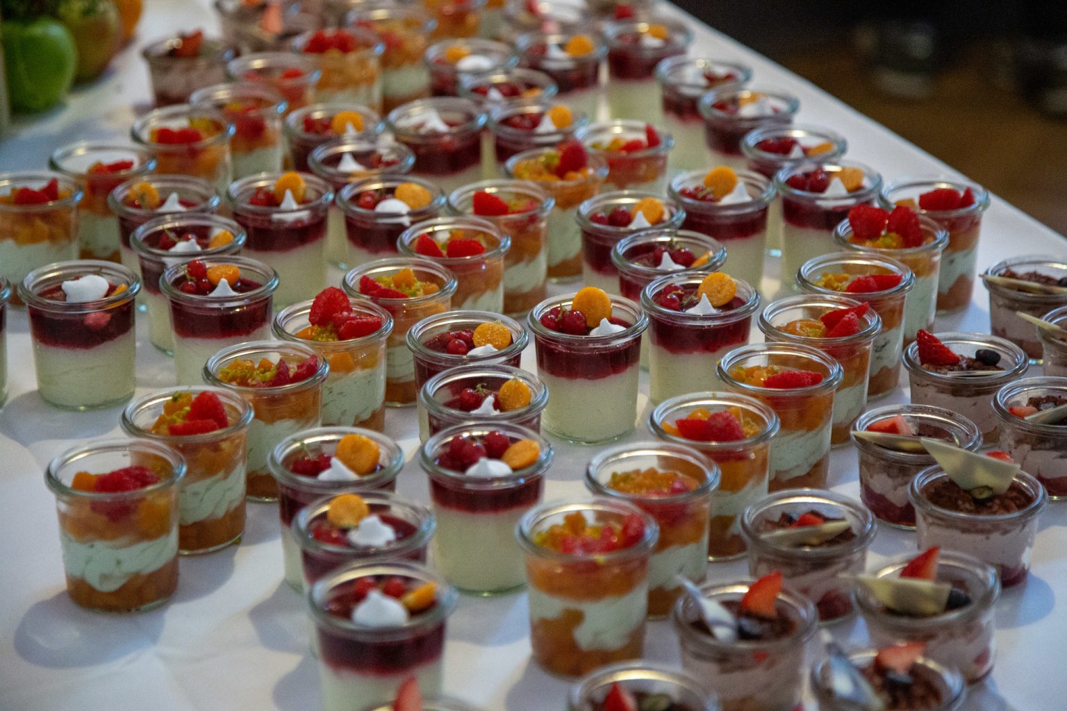 photo of a table with deserts on it